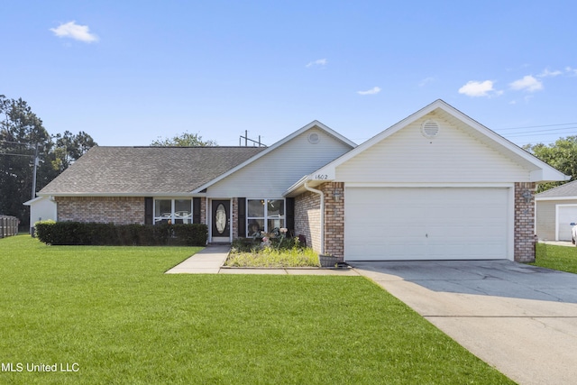 1602 Heather Ct, Ocean Springs, MS 39564 - single story home featuring brick siding, driveway, a front yard, and a garage