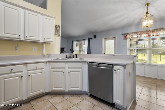 1602 Heather Ct, Ocean Springs, MS 39564 - kitchen with a sink, white cabinets, stainless steel dishwasher, and light tile patterned flooring