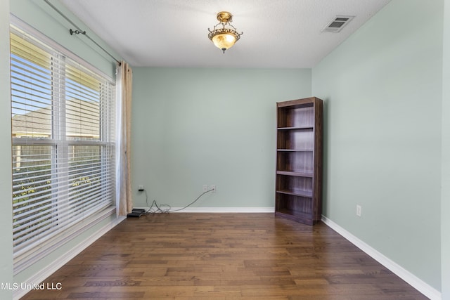 1602 Heather Ct, Ocean Springs, MS 39564 - unfurnished room featuring baseboards, visible vents, and wood finished floors