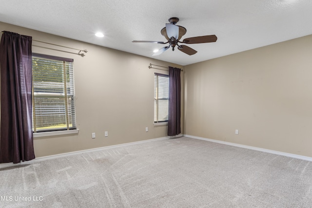 1602 Heather Ct, Ocean Springs, MS 39564 - carpeted spare room with a ceiling fan, baseboards, recessed lighting, and a wealth of natural light