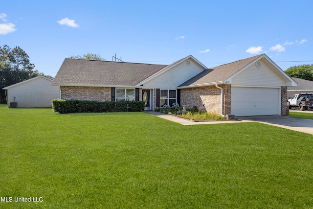 ranch-style home with a front lawn and a garage