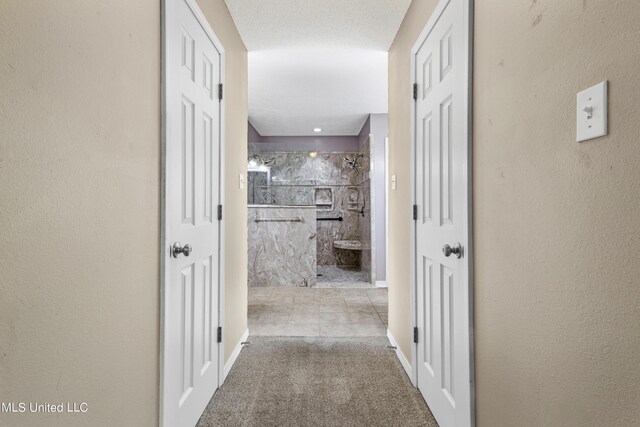 1602 Heather Ct, Ocean Springs, MS 39564 - hall featuring baseboards and carpet