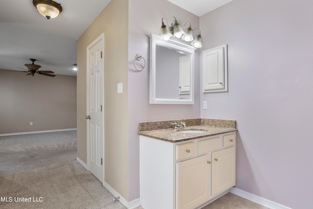 bathroom with vanity and ceiling fan