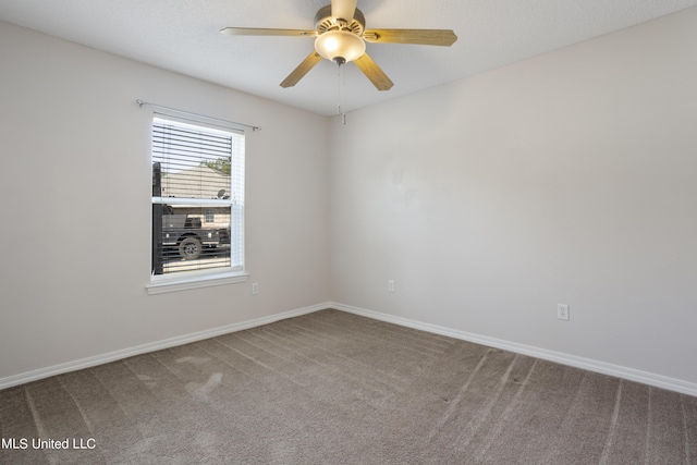 1602 Heather Ct, Ocean Springs, MS 39564 - carpeted spare room with baseboards and a ceiling fan