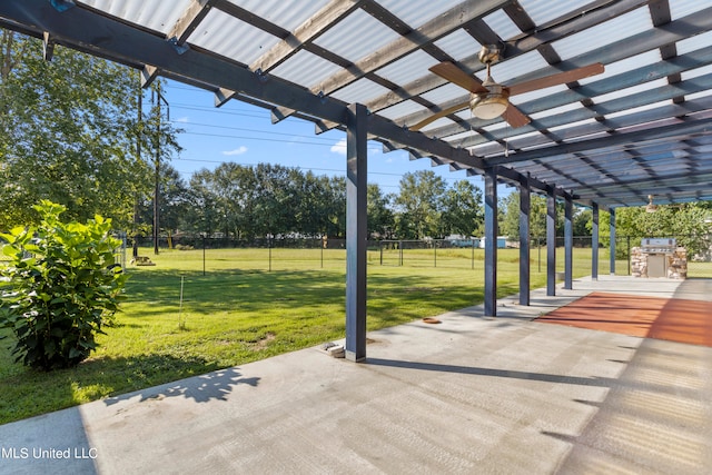 view of patio featuring ceiling fan and a pergola