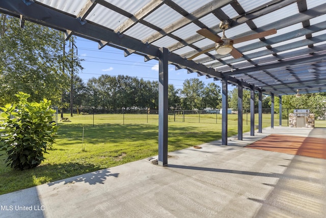 1602 Heather Ct, Ocean Springs, MS 39564 - view of patio featuring a ceiling fan, fence, and a pergola