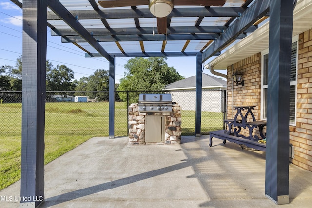 1602 Heather Ct, Ocean Springs, MS 39564 - view of patio / terrace featuring area for grilling, a pergola, fence, and an outdoor kitchen