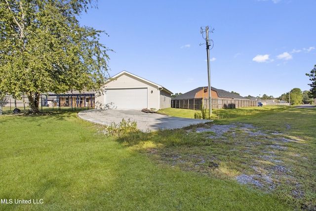 1602 Heather Ct, Ocean Springs, MS 39564 - view of front of property featuring an outdoor structure, fence, a front yard, and concrete driveway