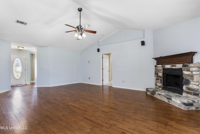 1602 Heather Ct, Ocean Springs, MS 39564 - unfurnished living room with visible vents, wood finished floors, baseboards, a stone fireplace, and a ceiling fan