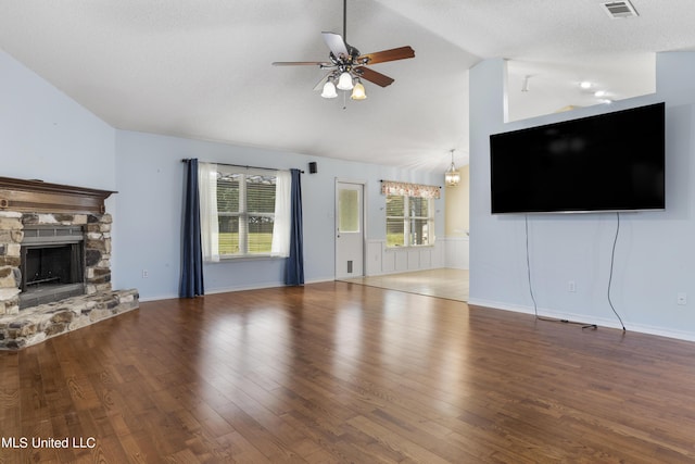 1602 Heather Ct, Ocean Springs, MS 39564 - unfurnished living room featuring ceiling fan, a fireplace, wood finished floors, and lofted ceiling