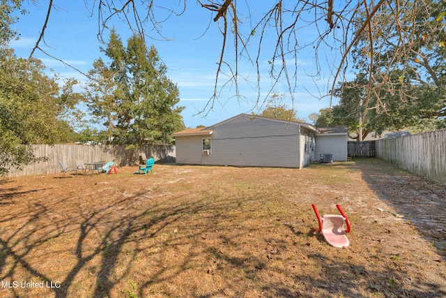 view of yard featuring central AC unit