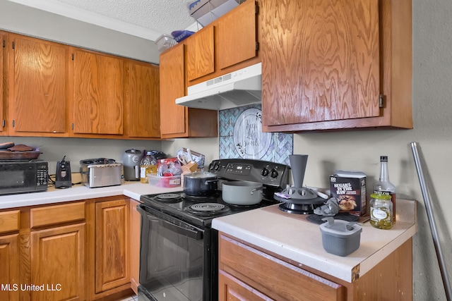 kitchen with black appliances and a textured ceiling