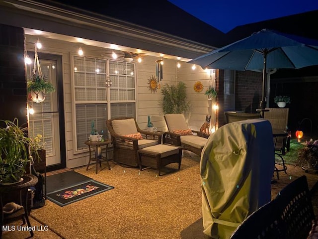 7741 Meadow Ridge Ln, Olive Branch, MS 38654 - patio at night with a patio area and an outdoor living space