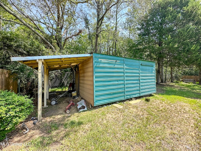 view of outdoor structure with a lawn