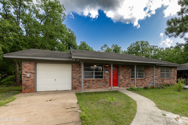 single story home featuring a front yard and a garage