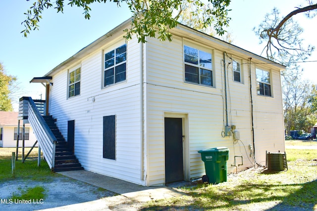 2201 15th Ave, Gulfport, MS 39501 - rear view of house with central air condition unit and stairs