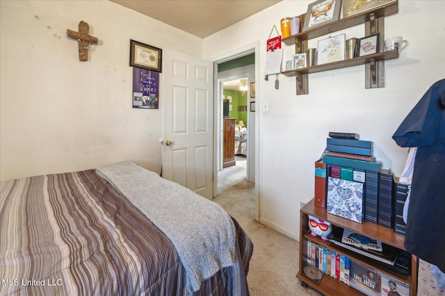 bedroom with light carpet