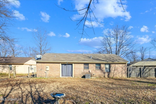 back of property with central AC unit