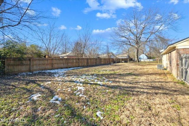 view of yard with central AC