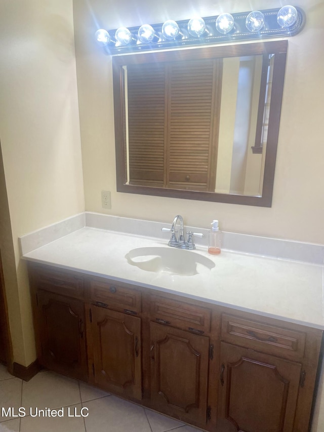 2909 Pimlico Dr, Ocean Springs, MS 39564 - bathroom with vanity and tile patterned floors
