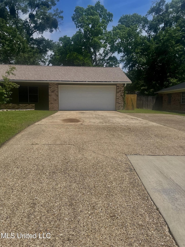 2909 Pimlico Dr, Ocean Springs, MS 39564 - garage featuring concrete driveway