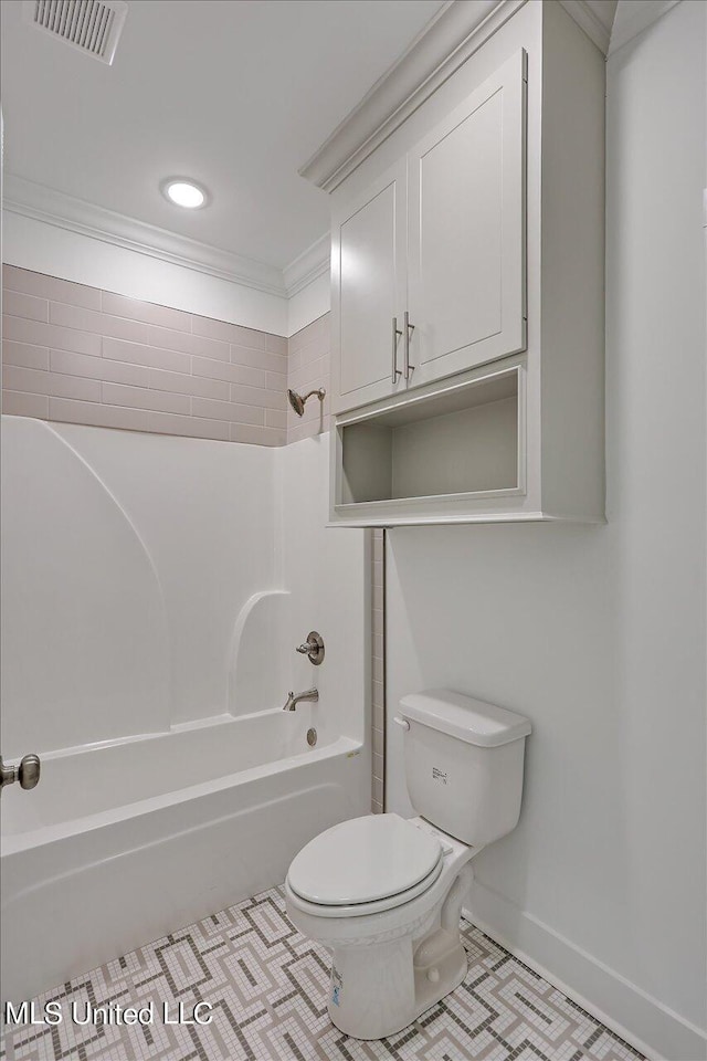 bathroom with tile patterned flooring, shower / bathtub combination, visible vents, toilet, and crown molding