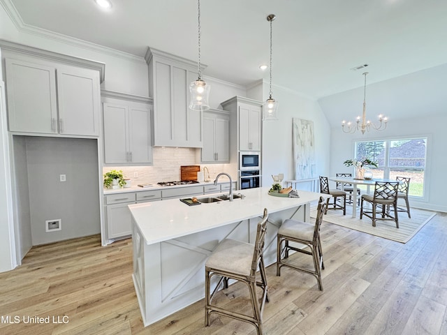 kitchen featuring decorative backsplash, stainless steel oven, white gas stovetop, light countertops, and visible vents