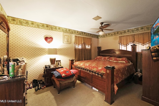 bedroom featuring carpet and a ceiling fan