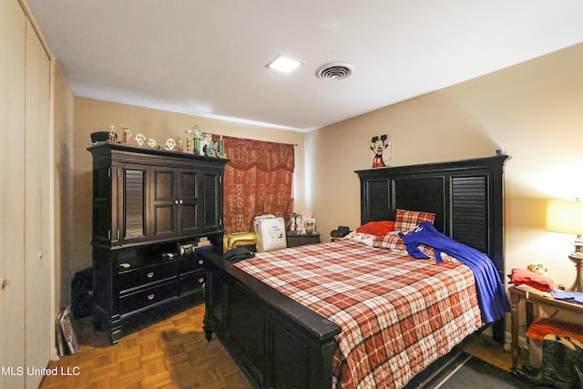 bedroom with parquet floors