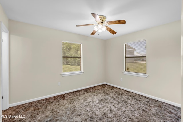 2309 Cottonwood Dr, Gulfport, MS 39503 - empty room featuring baseboards, a ceiling fan, and carpet