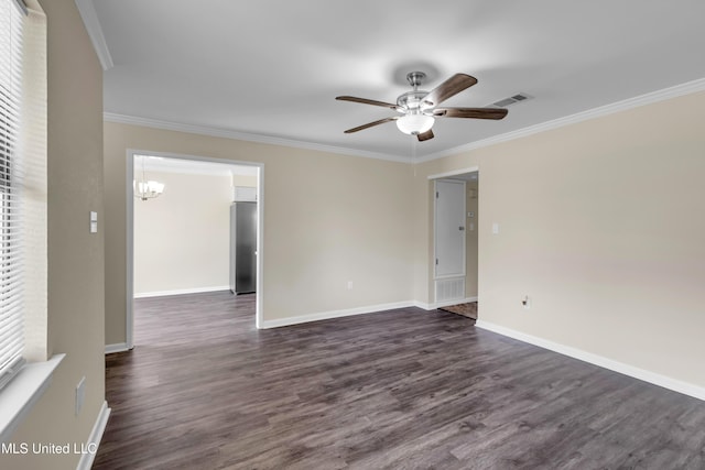 2309 Cottonwood Dr, Gulfport, MS 39503 - spare room with crown molding, ceiling fan with notable chandelier, and dark wood-type flooring