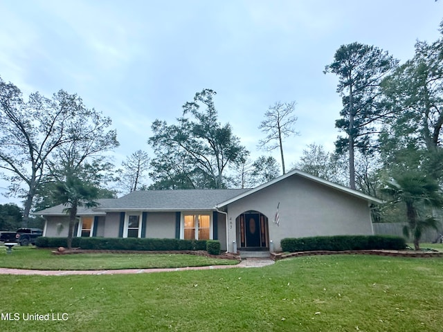 ranch-style house with a front yard