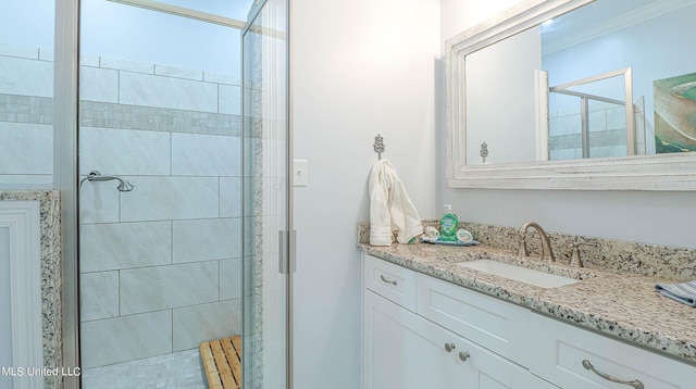 bathroom with vanity and walk in shower