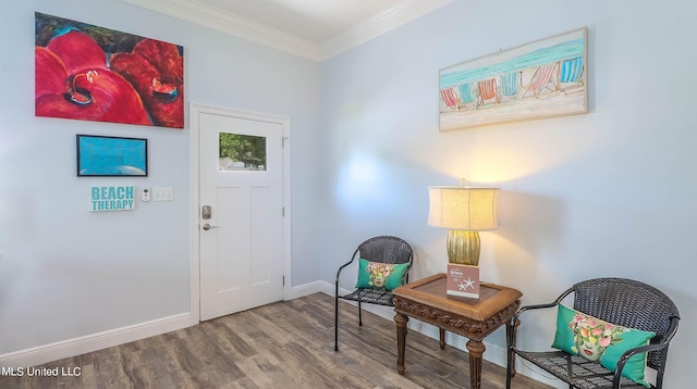 interior space with ornamental molding and wood-type flooring