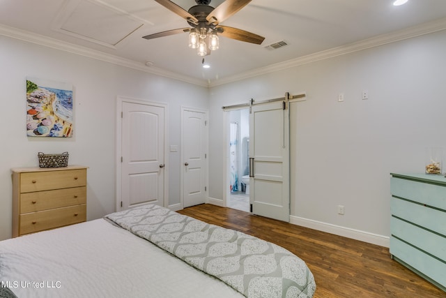 bedroom with ceiling fan, a barn door, connected bathroom, ornamental molding, and dark wood-type flooring