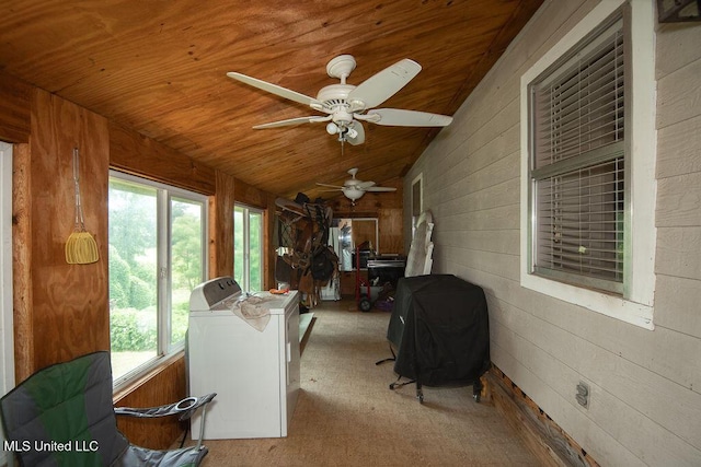 900 Old Benton Rd, Yazoo City, MS 39194 - sunroom with washer / clothes dryer, wood ceiling, vaulted ceiling, healthy amount of natural light, and wood walls