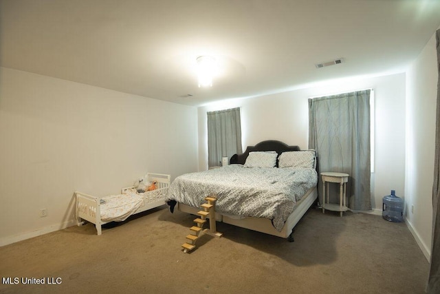 900 Old Benton Rd, Yazoo City, MS 39194 - bedroom with carpet floors and baseboards