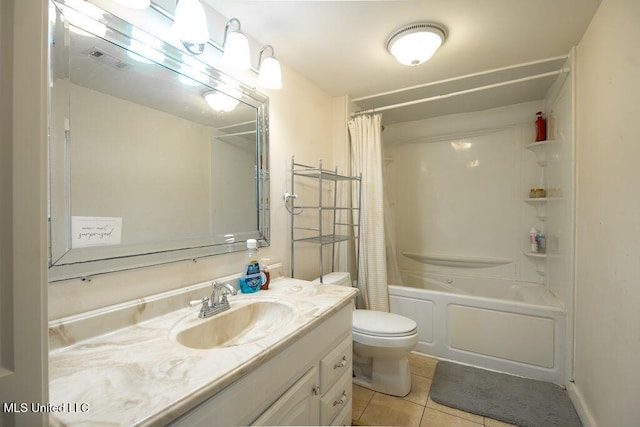 900 Old Benton Rd, Yazoo City, MS 39194 - bathroom featuring tile patterned floors, vanity, toilet, and shower / bath combo