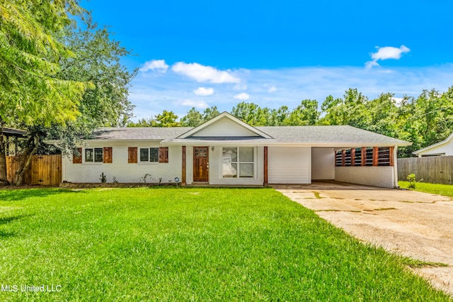 ranch-style home with a carport and a front lawn