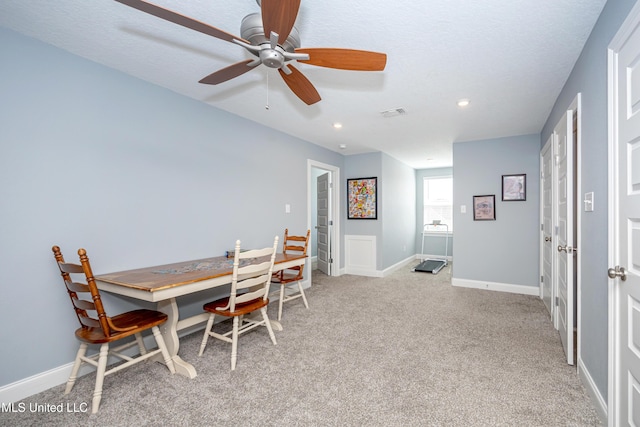 dining space with recessed lighting, visible vents, a ceiling fan, light carpet, and baseboards