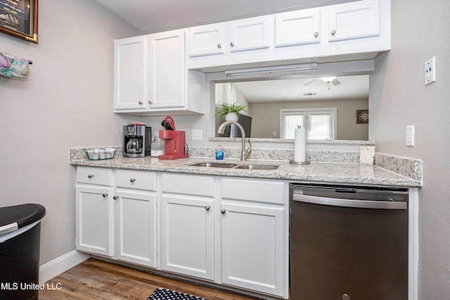 kitchen featuring dishwasher, white cabinetry, sink, and dark wood-type flooring