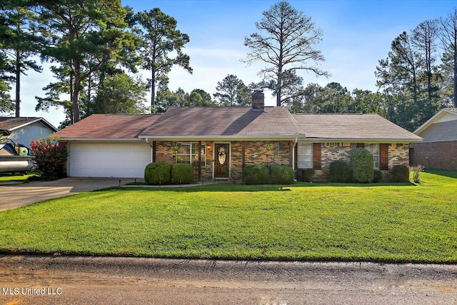 ranch-style house featuring a garage and a front yard