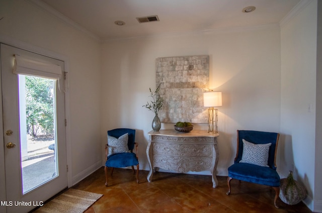 living area with tile patterned floors and crown molding