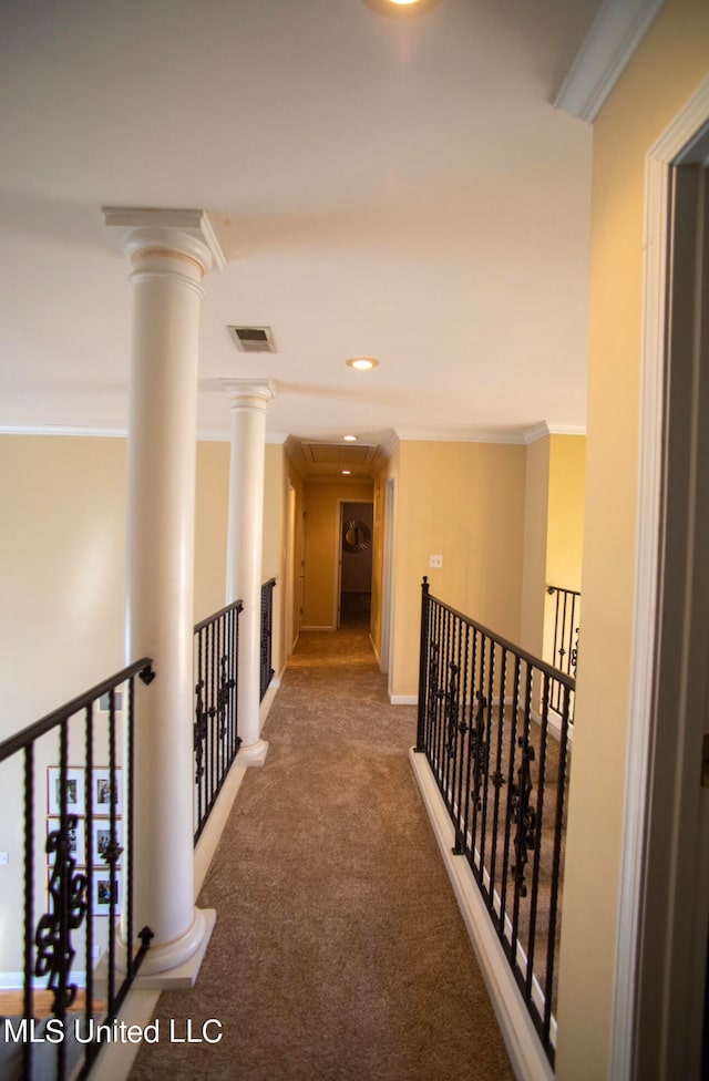 hall with carpet flooring and crown molding