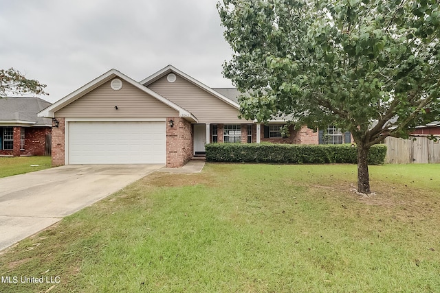 view of front facade featuring a front yard and a garage