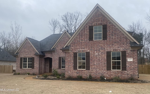 view of property with a front lawn