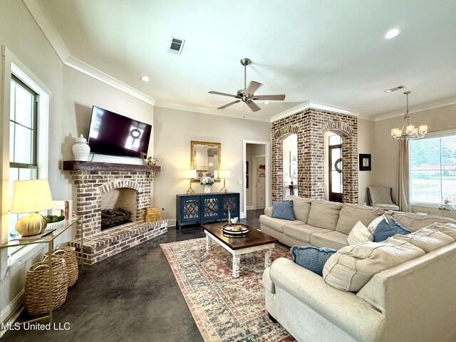 living room featuring a chandelier, a fireplace, ceiling fan, crown molding, and recessed lighting