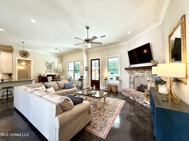living area with concrete flooring, ceiling fan, crown molding, recessed lighting, and a fireplace