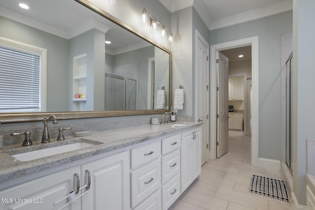 508 Forest Glen Ln, Brandon, MS 39047 - bathroom featuring a stall shower, double vanity, ornamental molding, recessed lighting, and tile patterned flooring