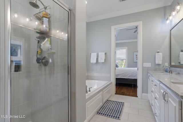 508 Forest Glen Ln, Brandon, MS 39047 - ensuite bathroom with crown molding, double vanity, a bath, a shower stall, and tile patterned flooring